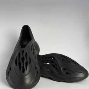 Men's all black futuristic foam runner clogs with carved ventilation cutouts